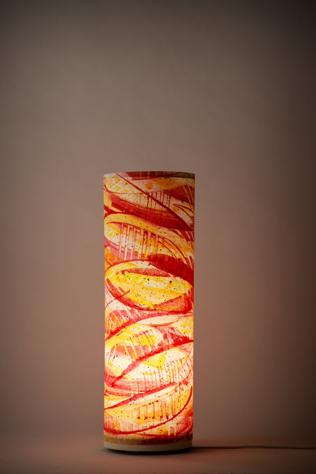Flux Ember Spiral bedroom lamp glowing in a darkened room, showcasing dramatic red and amber tones with expressive spiral brushwork. Painted by Patricia Branstead.